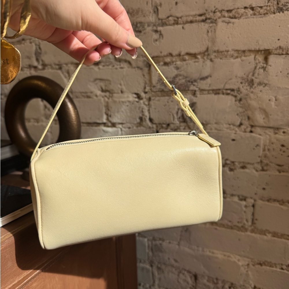 The Row Light Yellow 90’s Bag with Minimalist Design